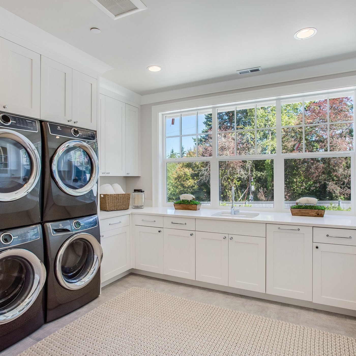 Laundry room remodel with cabinetry and a folding counter